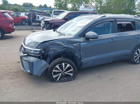 3VVNX7B28PM317056 2023 VOLKSWAGEN TAOS Gray Front view