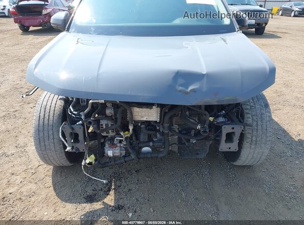 3VVNX7B2XPM300467 2023 VOLKSWAGEN TAOS Gray Вид спереду
