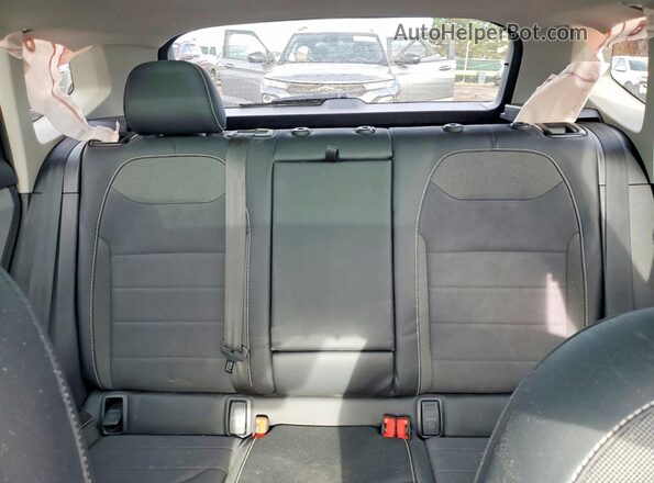 3VVPX7B25NM040968 2022 VOLKSWAGEN TAOS Black Vista de los asientos traseros