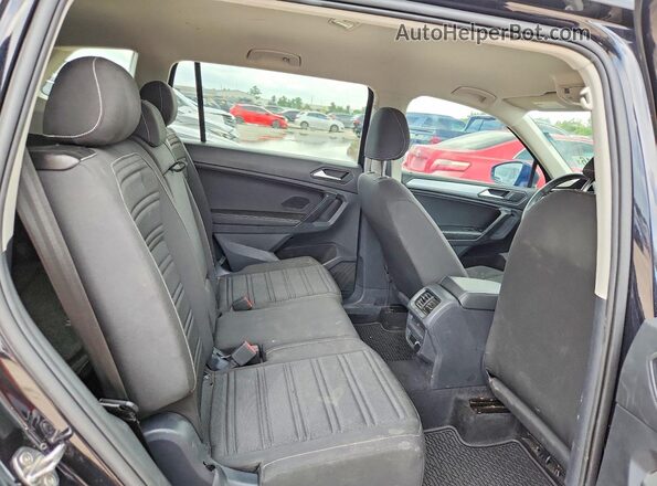 3VVRB7AX4RM197126 2024 VOLKSWAGEN TIGUAN Black Vista de los asientos traseros