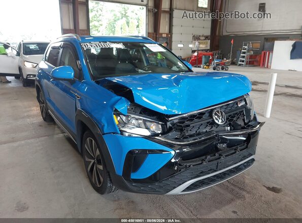 3VVSX7B20NM004261 2022 VOLKSWAGEN TAOS Синий Вид спереди