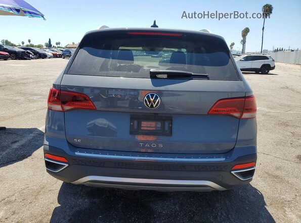3VVSX7B2XPM302755 2023 VOLKSWAGEN TAOS Gray Вид ззаду