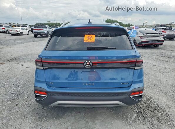 3VVUC7B26TM008574 2026 VOLKSWAGEN OTHER Blue Widok wnętrza z przodu
