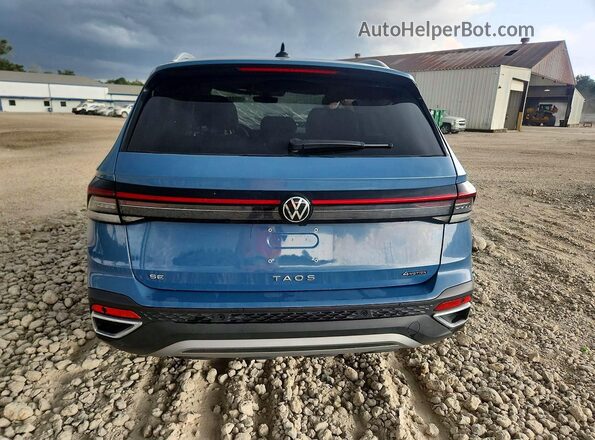 3VVUC7B2XTM024714 2026 VOLKSWAGEN TAOS Blue Вид ззаду