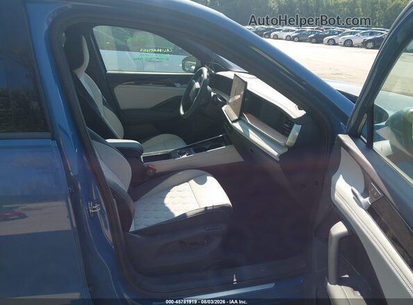 3VVUW7RM6TM070328 2026 VOLKSWAGEN TIGUAN Blue Front interior view