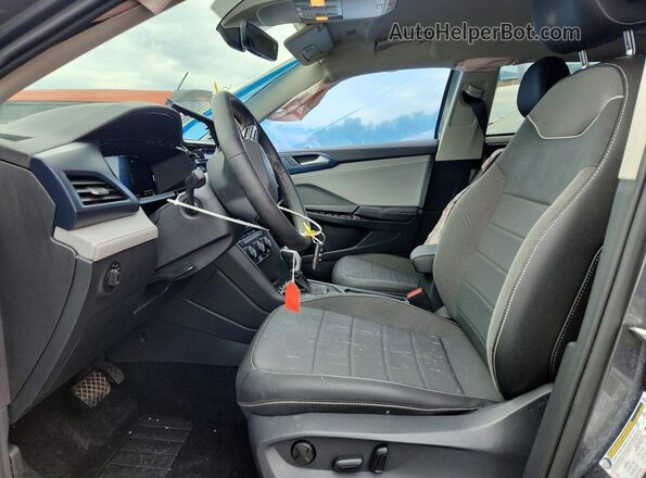 3VVUX7B23RM097064 2024 VOLKSWAGEN TAOS Charcoal Вид салону спереду