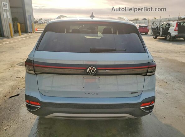 3VVVC7B28SM034550 2025 VOLKSWAGEN TAOS Blue Вид ззаду