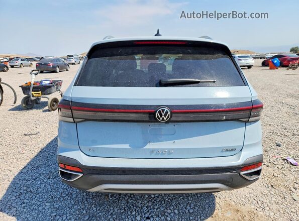 3VVVC7B28SM044480 2025 VOLKSWAGEN TAOS Бирюзовый Вид сзади