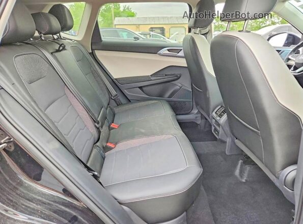 3VVVC7B2XSM009584 2025 VOLKSWAGEN TAOS Черный Вид задней части салона