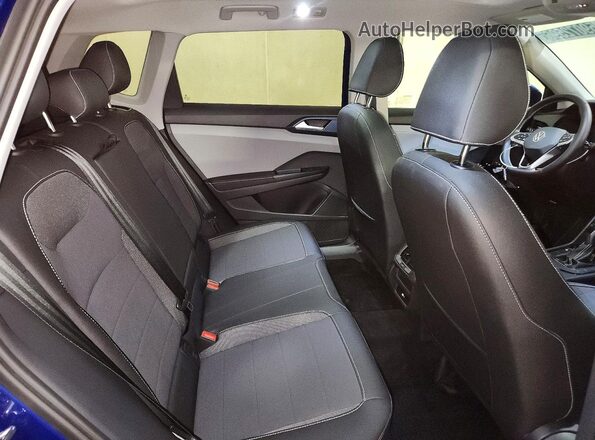 3VVVX7B23RM065431 2024 VOLKSWAGEN TAOS Blue Widok wnętrza z tyłu