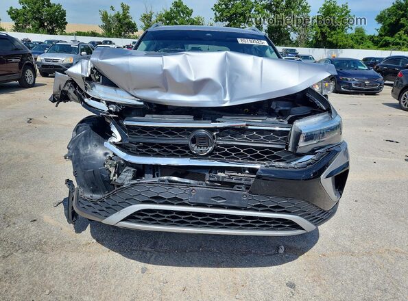 3VVVX7B2XRM033883 2024 VOLKSWAGEN TAOS Silver Widok z przodu