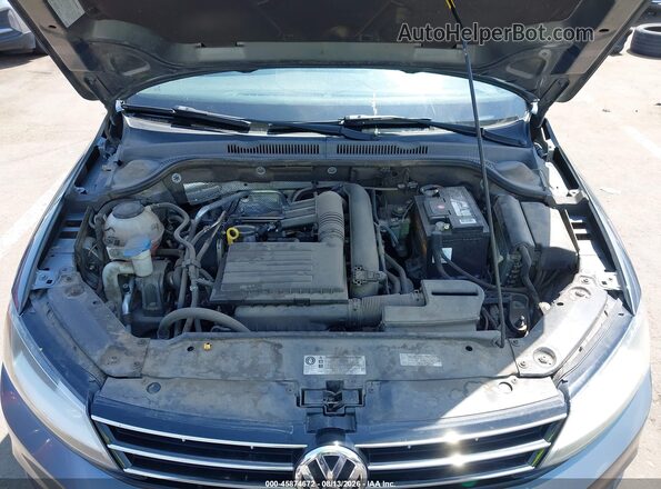 3VW167AJ9JM215309 2018 VOLKSWAGEN JETTA Gray Vista trasera