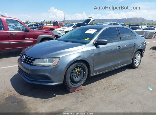 3VW167AJ9JM215309 2018 VOLKSWAGEN JETTA Gray Vista tres cuartos delantera izquierda