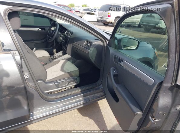 3VW167AJ9JM215309 2018 VOLKSWAGEN JETTA Gray Vista interior delantera