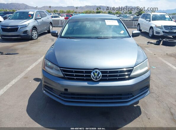 3VW167AJ9JM215309 2018 VOLKSWAGEN JETTA Gray Vista interior trasera