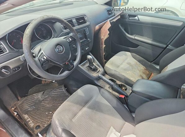 3VW2B7AJ0HM372091 2017 VOLKSWAGEN JETTA Brown Вид панелі приладів