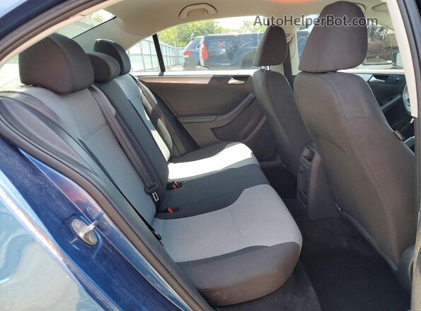 3VW2B7AJ1JM262401 2018 VOLKSWAGEN JETTA Blue Vista de los asientos traseros
