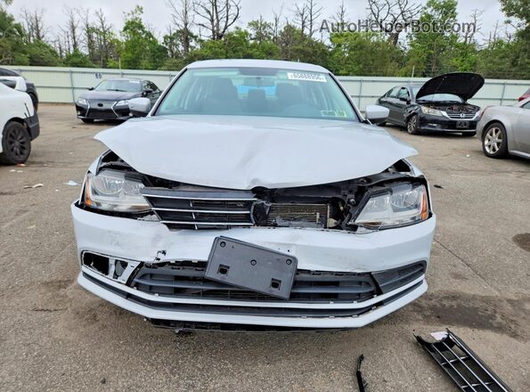 3VW2B7AJ4JM217467 2018 VOLKSWAGEN JETTA Серый Вид спереди