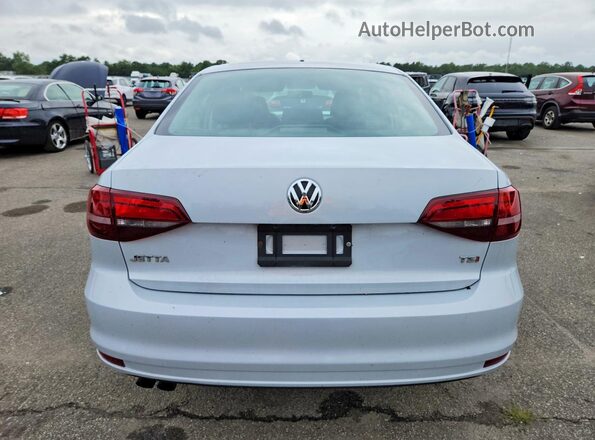 3VW2B7AJ4JM217467 2018 VOLKSWAGEN JETTA Серый Вид сзади
