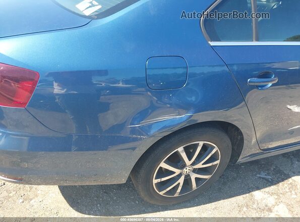 3VW2B7AJ5HM239519 2017 VOLKSWAGEN JETTA Синий Вид задней части салона