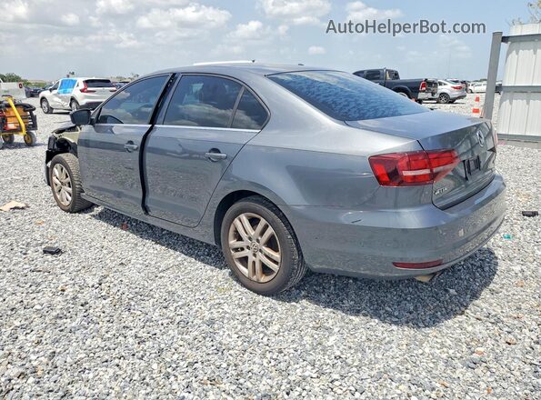 3VW2B7AJ5HM324649 2017 VOLKSWAGEN JETTA Gray Rear left