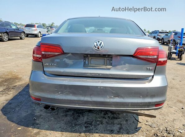 3VW2B7AJ5HM329348 2017 VOLKSWAGEN JETTA Gray Vista trasera