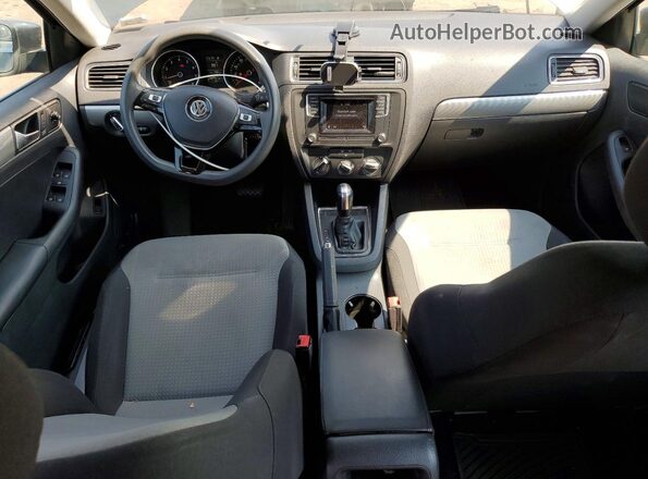 3VW2B7AJ5HM329348 2017 VOLKSWAGEN JETTA Gray Vista del salpicadero