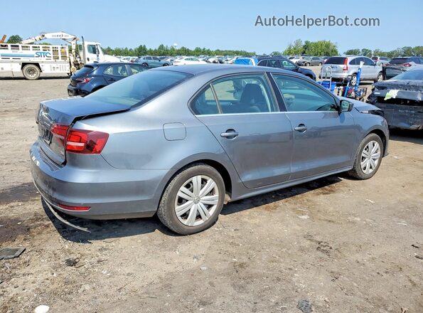 3VW2B7AJ5HM329348 2017 VOLKSWAGEN JETTA Gray Trasero derecho