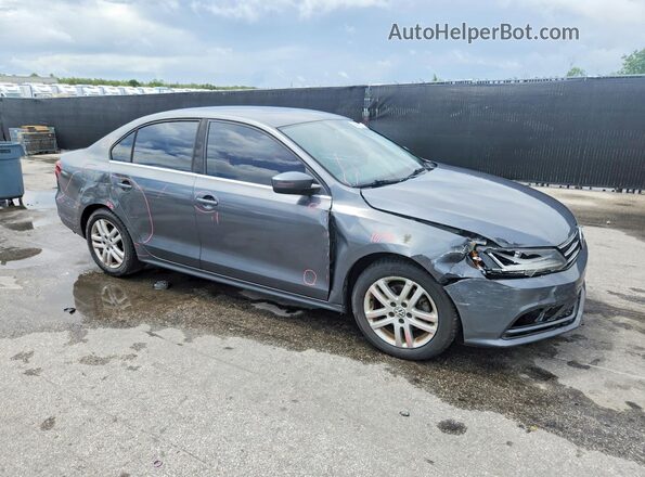3VW2B7AJ9HM325349 2017 VOLKSWAGEN JETTA Gray Przód prawy