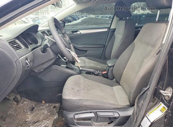 3VW2B7AJ9HM415343 2017 VOLKSWAGEN JETTA Black Front interior view