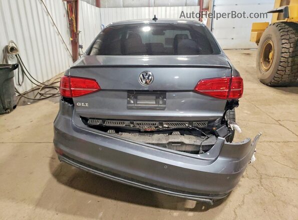 3VW4T7AJ1HM331040 2017 VOLKSWAGEN JETTA Gray Rear view