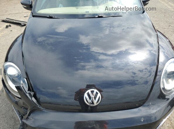 3VW517AT7HM825270 2017 VOLKSWAGEN BEETLE Black Вид задньої частини салону