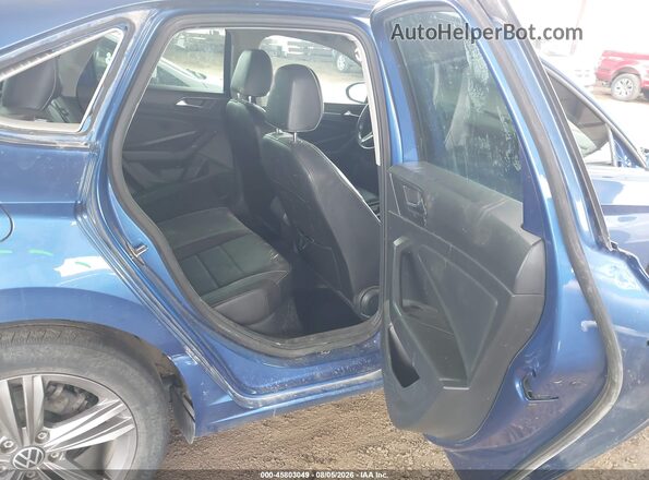 3VW7M7BU2NM021672 2022 VOLKSWAGEN JETTA Blue Widok naklejki z numerem VIN
