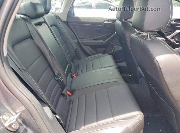 3VW7M7BU8RM016935 2024 VOLKSWAGEN JETTA Gray Rear seats view