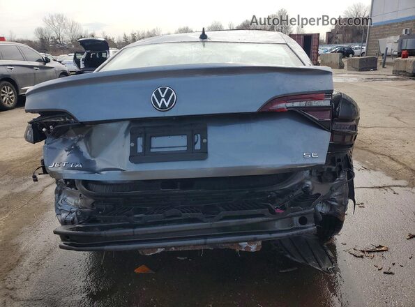 3VW7M7BUXPM024807 2023 VOLKSWAGEN JETTA Gray Vista trasera