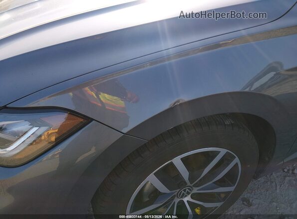 3VW7X7BU0SM030308 2025 VOLKSWAGEN JETTA Gray Front view