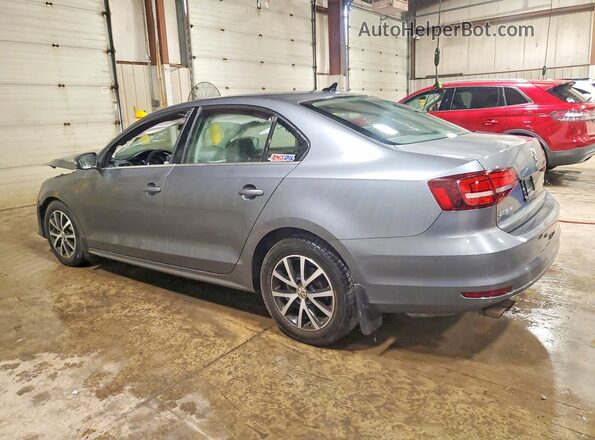 3VWB67AJ4HM222019 2017 VOLKSWAGEN JETTA Gray Rear left