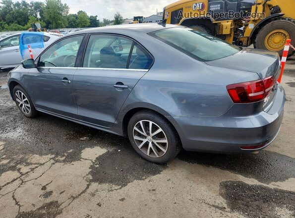 3VWB67AJ6JM226787 2018 VOLKSWAGEN JETTA Gray Задня ліва чверть