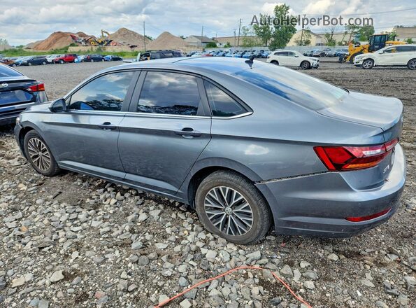3VWC57BU2KM090594 2019 VOLKSWAGEN JETTA Gray Rear left