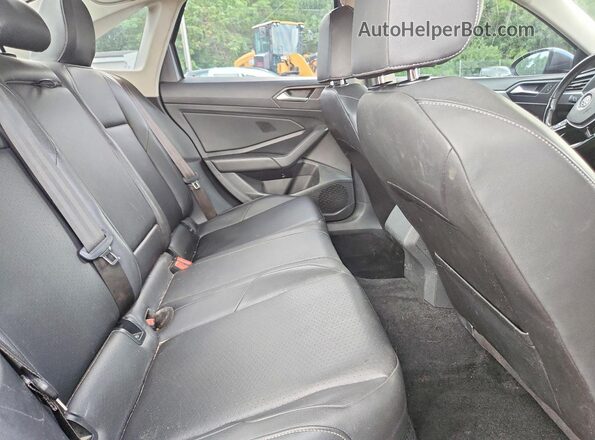 3VWC57BU2KM090594 2019 VOLKSWAGEN JETTA Gray Rear seats view