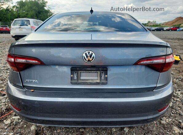 3VWC57BU2KM090594 2019 VOLKSWAGEN JETTA Gray Rear view