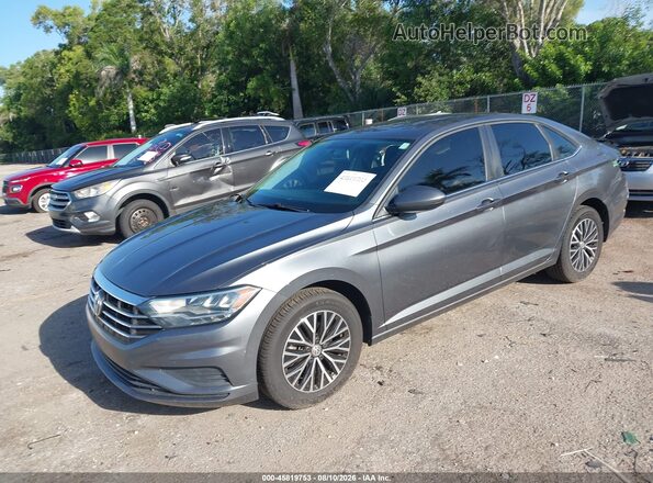 3VWC57BU3MM020962 2021 VOLKSWAGEN JETTA Gray Vista tres cuartos delantera izquierda