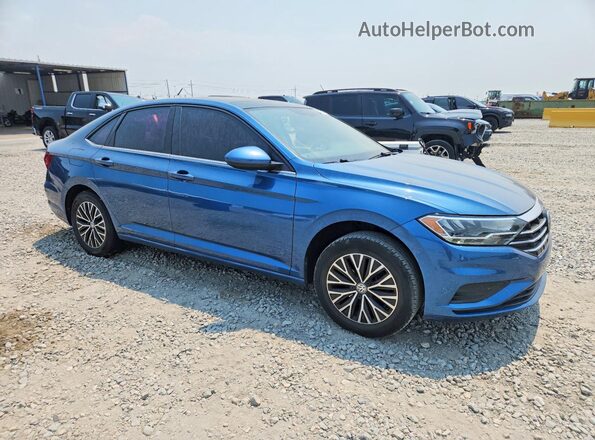 3VWCB7BU0KM210210 2019 VOLKSWAGEN JETTA Синий Передняя правая четверть