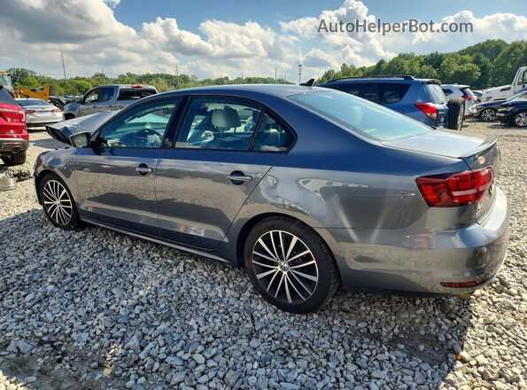 3VWD17AJ5GM286348 2016 VOLKSWAGEN JETTA Gray Rear left