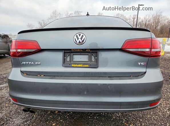 3VWD17AJ6JM241099 2018 VOLKSWAGEN JETTA Gray Widok z tyłu