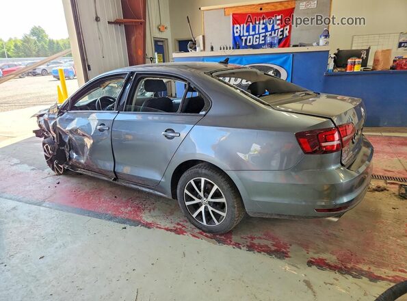 3VWD67AJ2GM398171 2016 VOLKSWAGEN JETTA Gray Rear left