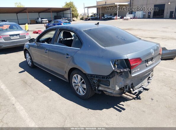 3VWD67AJ2GM418872 2016 VOLKSWAGEN JETTA Gray Tył lewy