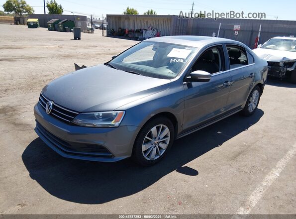 3VWD67AJ2GM418872 2016 VOLKSWAGEN JETTA Gray Przód lewy
