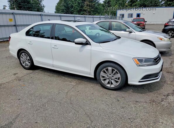 3VWD67AJ3GM345267 2016 VOLKSWAGEN JETTA Белый Передняя правая четверть