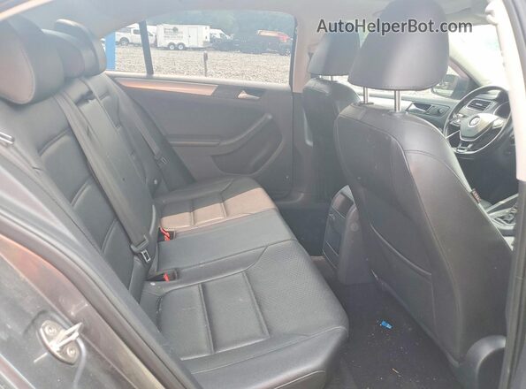 3VWD67AJ3GM360089 2016 VOLKSWAGEN JETTA Gray Vista de los asientos traseros